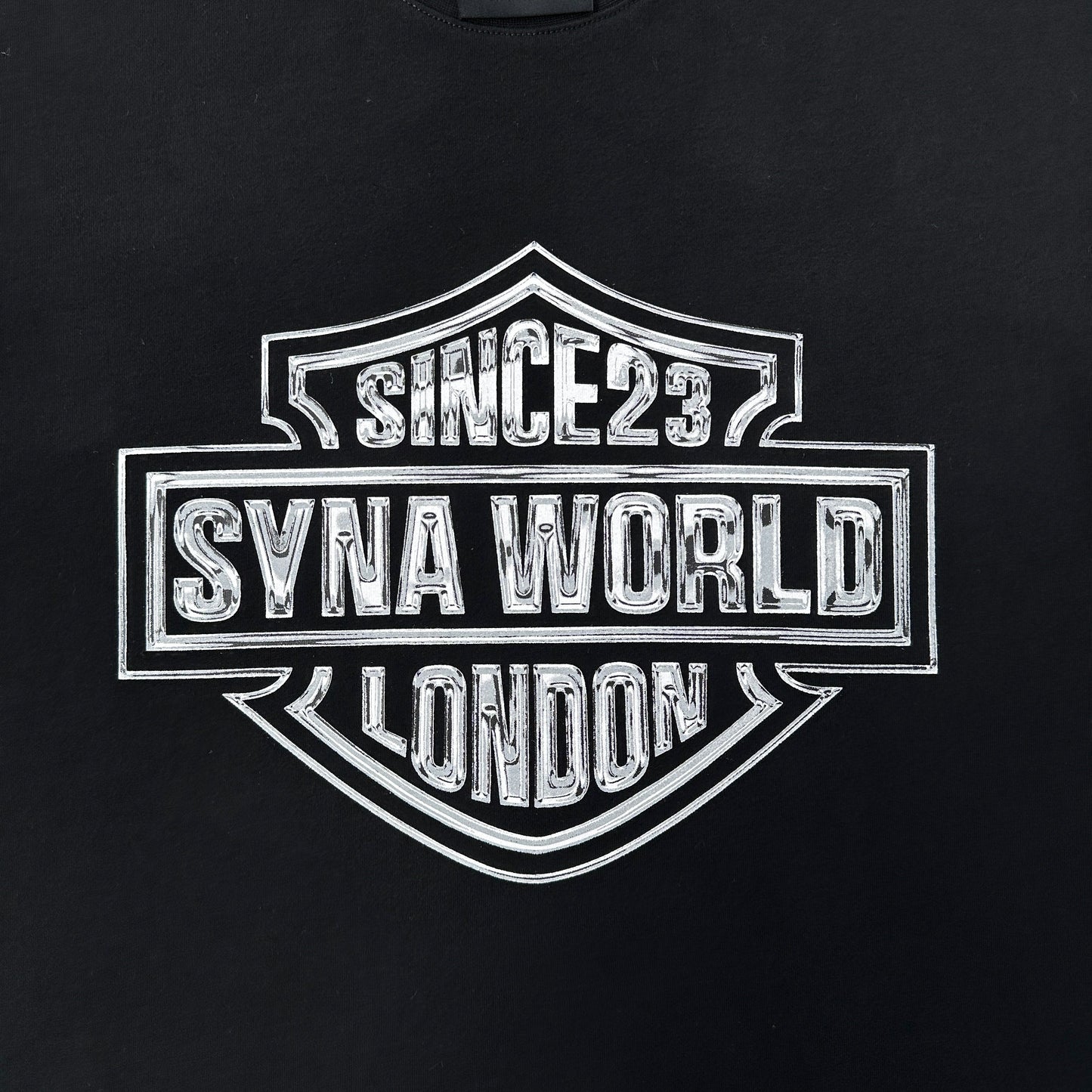 Syna World Chrome Badge Tee Black
