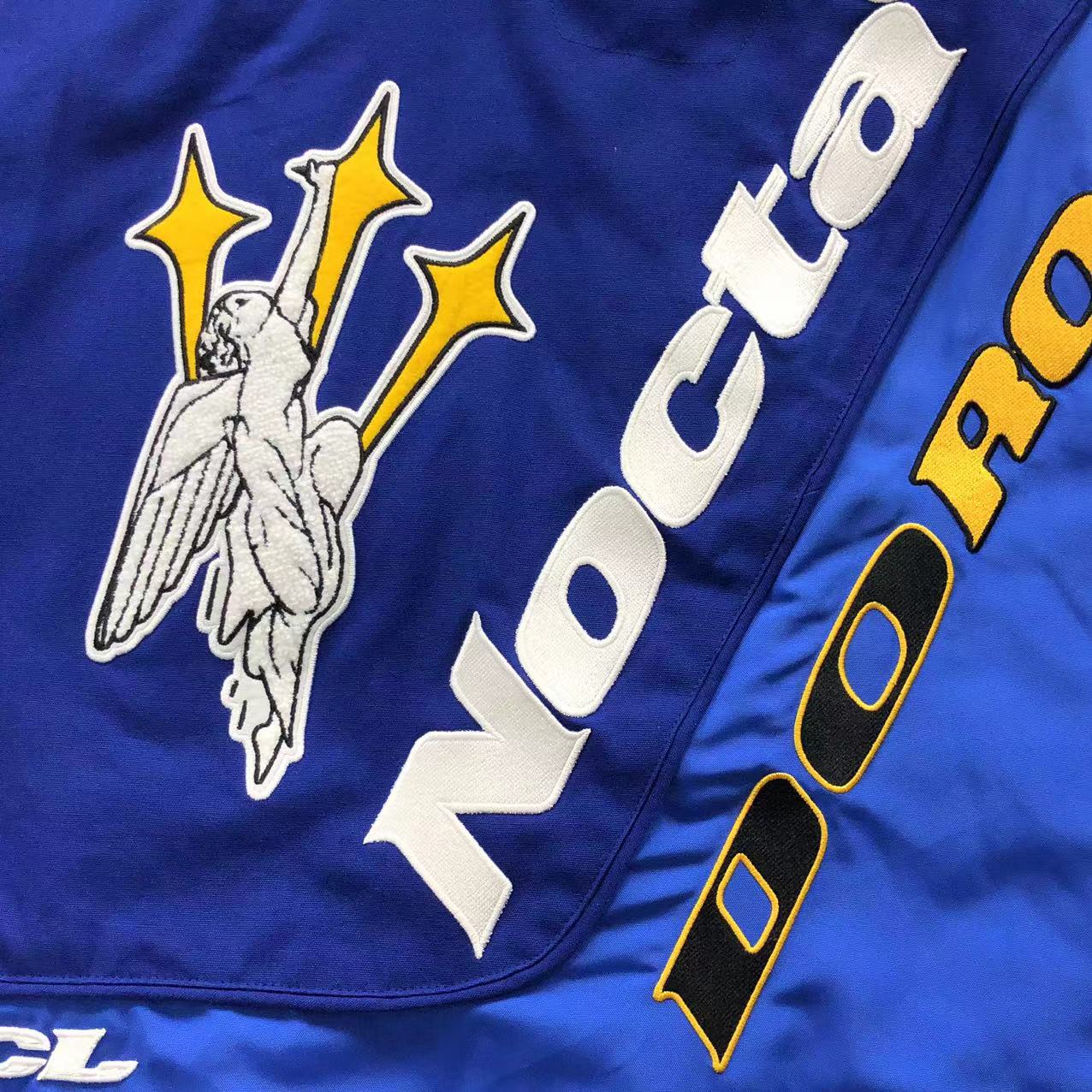 NOCTA L’Art Racing Jacket Royal Blue