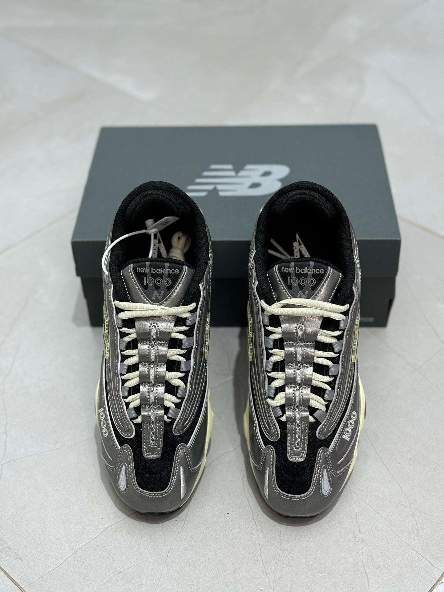 New Balance 1000 Silver Metallic Black Dawn Glow